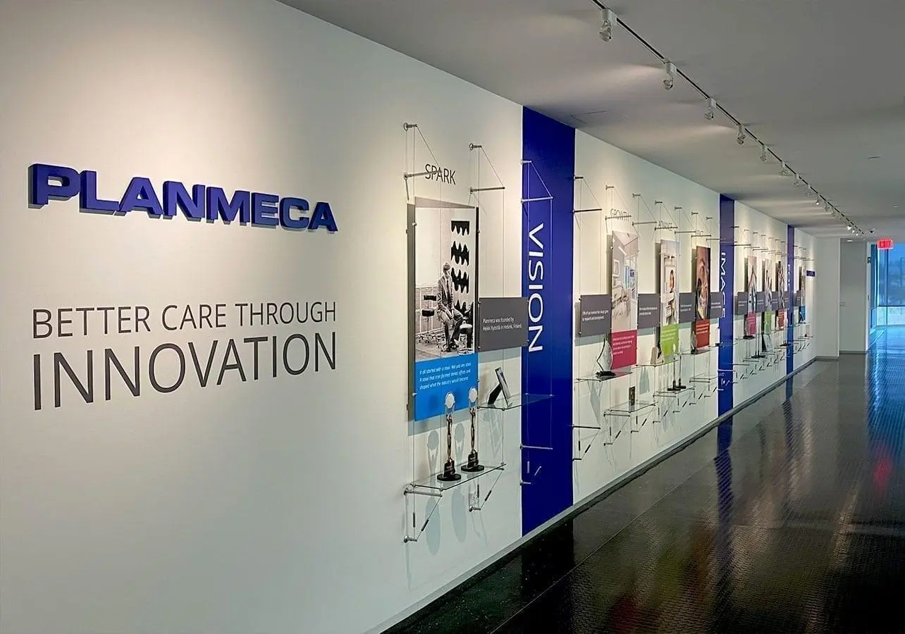 C1033 — Wall-to-Wall Cable Suspended Posters, Signage, and Glass Shelving