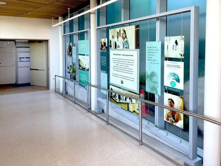 C1234 — Poster Graphics Suspended with Tension Cable Systems in a Corporate Environment