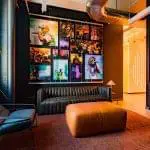 T2043 — Wall Display with Rail Mounted Tension Cables for Soundcloud NYC Office Remodel