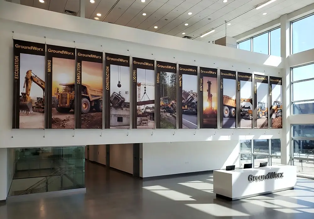 H2022 — Corporate Product Wall Display / Graphic Banners Suspended with Cable Systems | Design Concept